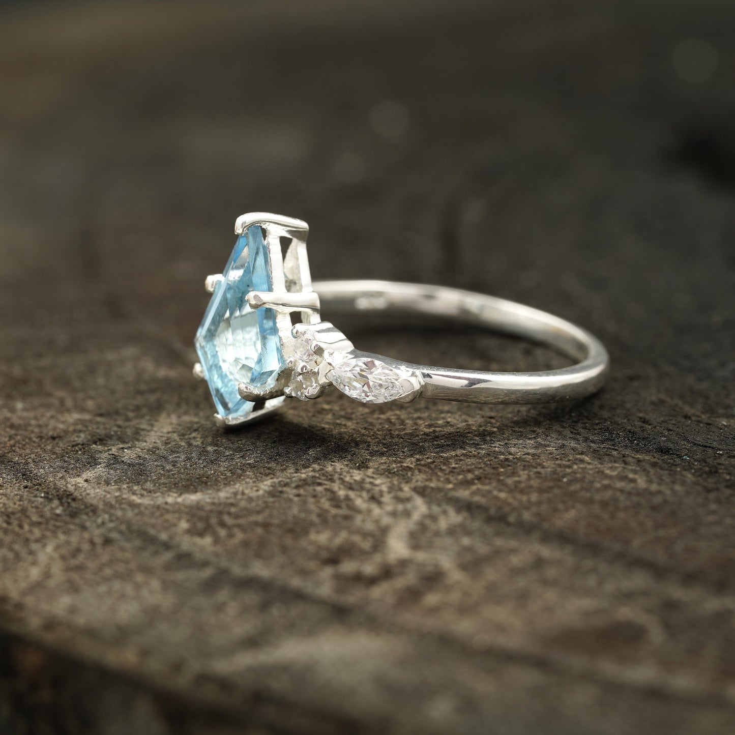 Handcrafted sterling silver ring with kite-shaped aquamarine
