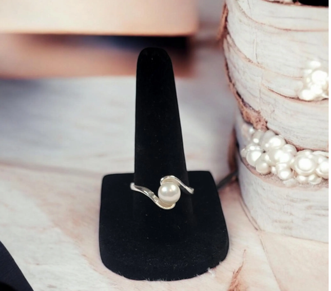 Offset Sterling Silver ring adorned with a 5mm luminous pearl at the center