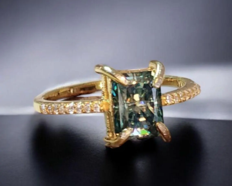 This Stunning Radiant cut Blue Green Moissanite Solitaire Ring