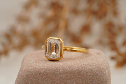 Emerald 1.5Ct Bezel Moissanite Engagement Ring Left SIde Angle