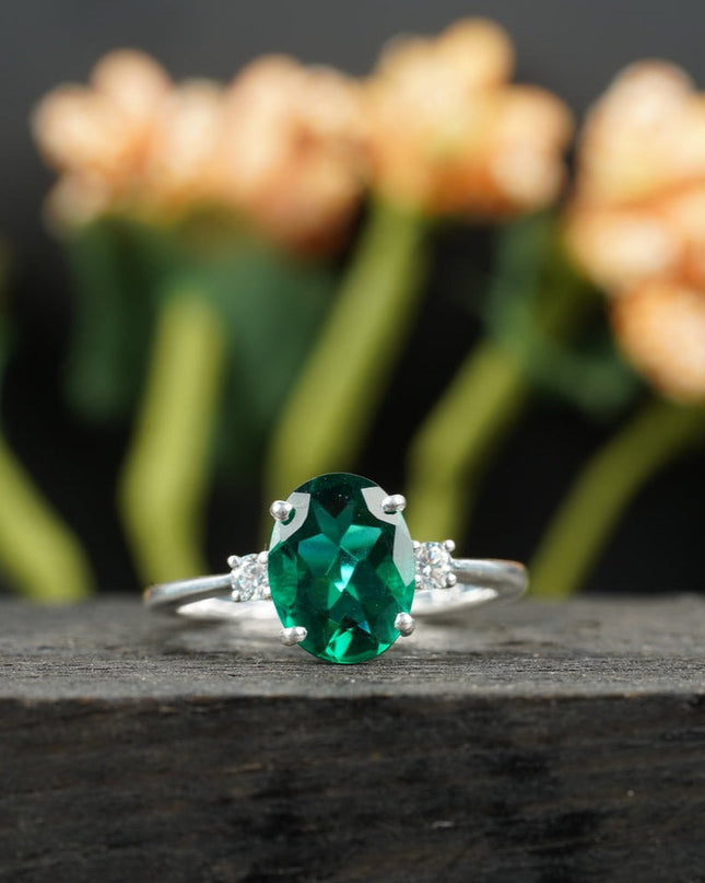 Oval Cut Emerald & Zirconia Three Stone Engagement Ring 