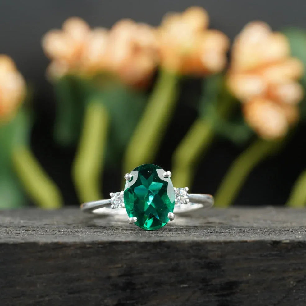 Oval Cut Emerald & Zirconia Three Stone Engagement Ring - Gigiscc