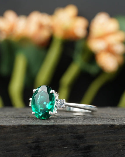 Oval Cut Emerald & Zirconia Three Stone Engagement Ring 