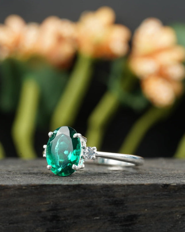 Oval Cut Emerald & Zirconia Three Stone Engagement Ring 