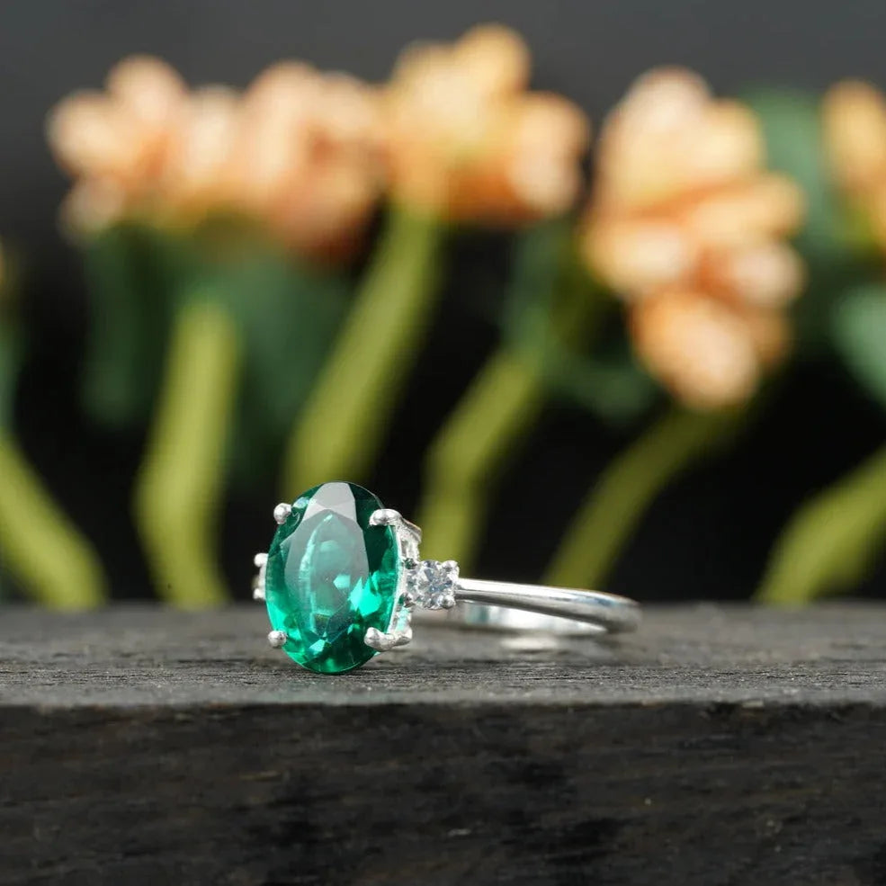 Oval Cut Emerald & Zirconia Three Stone Engagement Ring - Gigiscc