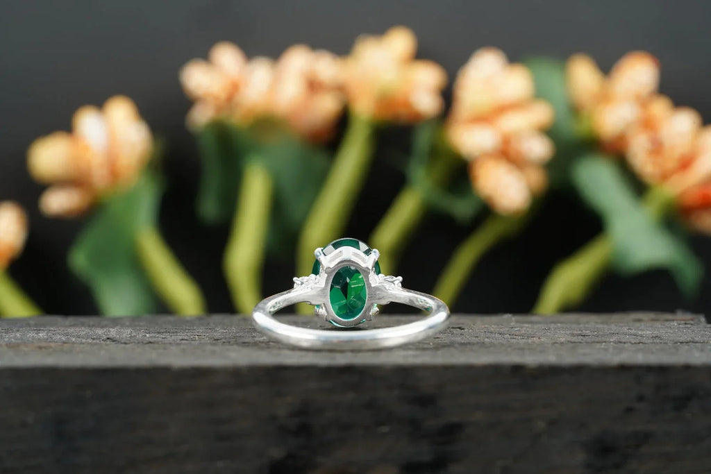 Oval Cut Emerald & Zirconia Three Stone Engagement Ring - Gigiscc