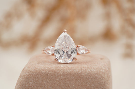 Pear Shaped Moissanite Three Stone Engagement Ring