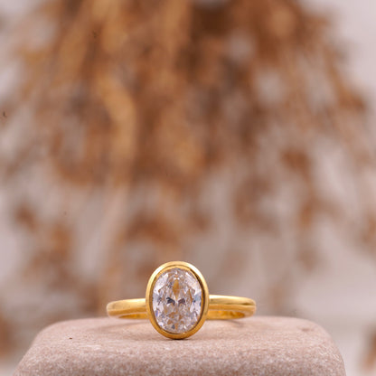 Oval Cut Bezel Set Engagement Ring