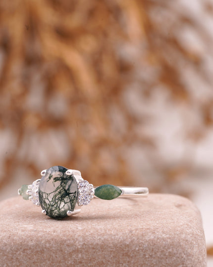 Moss Agate Oval Cut Silver Engagement Ring Left Angle