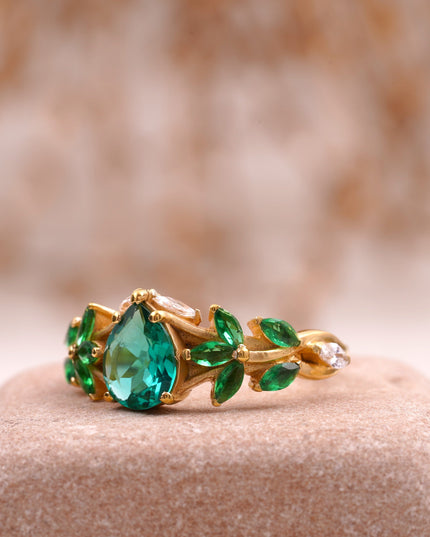 Pear Emerald Cluster Marquise Gold Engagement Ring Left Angle
