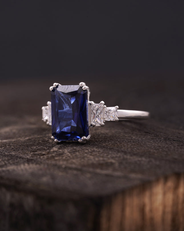 Emerald Blue Sapphire Silver Engagement Ring Left Angle