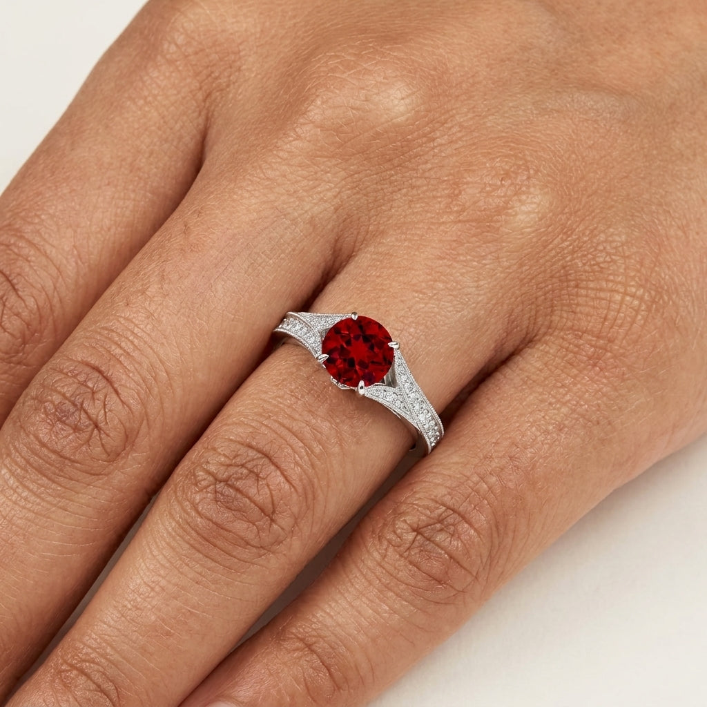Round Ruby Split Shank Engagement Ring in model hand