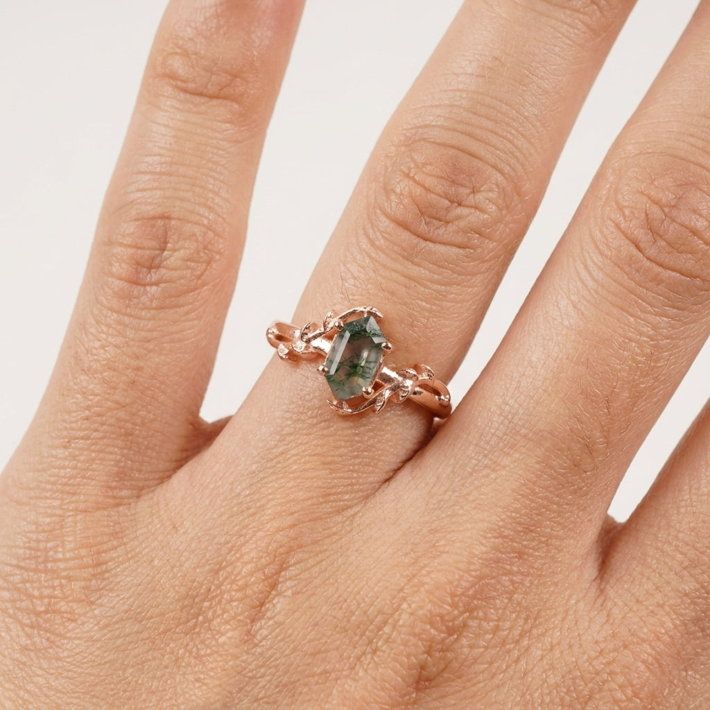 Long Hexagon Cut Moss Agate Leaf Solitaire Ring with hand