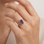 Oval Alexandrite Color-Change Stone 14K Rose Gold Halo Diamond Engagement Ring With Model Hand