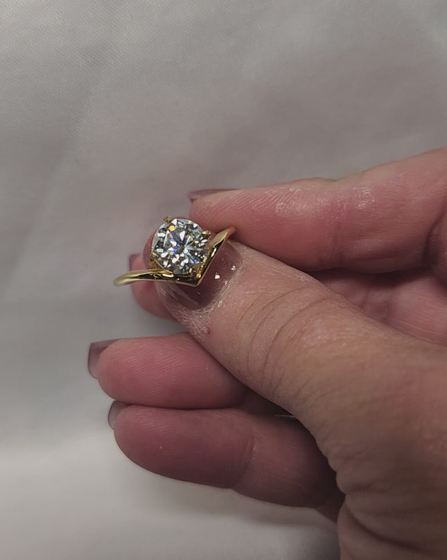 Stunning 2ct Round Brilliant Cut offset Moissanite Solitaire setting.