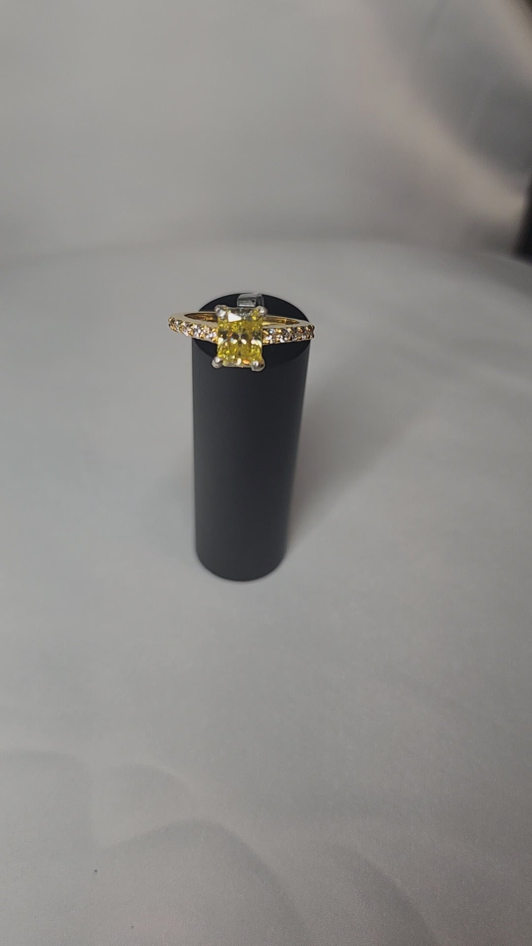 2ct Exquisite Yellow Radiant Cut Moissanite Solitaire Ring. A Timeless Appeal enhanced by moissanite  side stones. GRA Certified, VVS1.