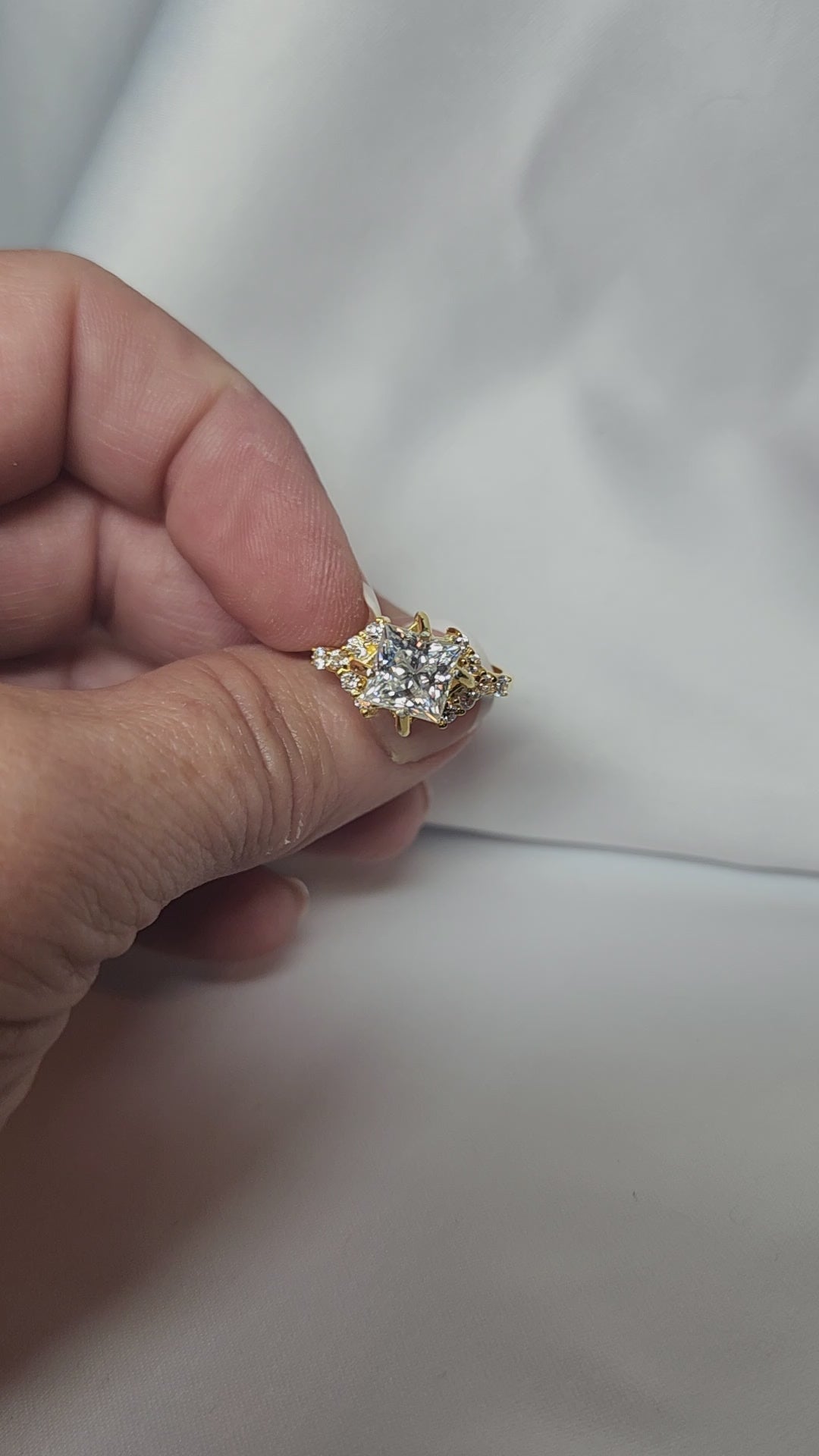2ct Exquisite Princess Cut Moissanite Solitaire Ring. A Timeless Appeal enhanced by moissanite  side stones. GRA Certified, VVS1.